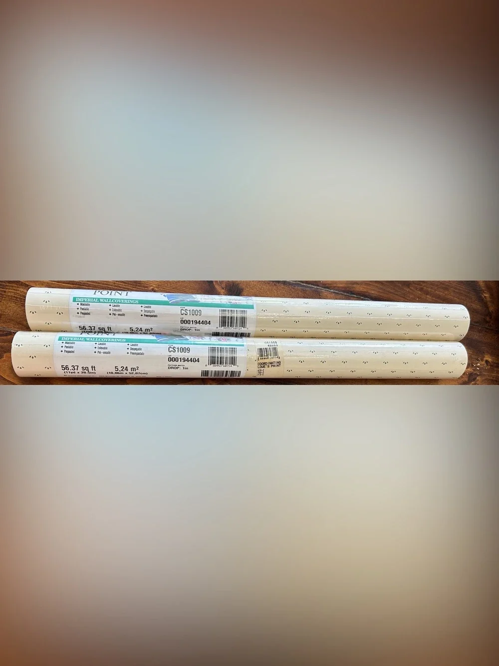 Two rolls of vintage wallpaper cream and dark green